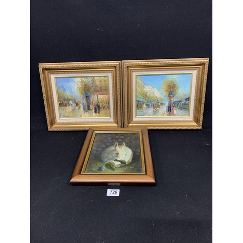 726 - Pair of Gilt framed canvas pictures of street scenes and Rabbit picture