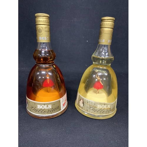 729 - Two Bols Ballerina Decanters, Apricot and Creme de banane, sealed and working, height 24 cms