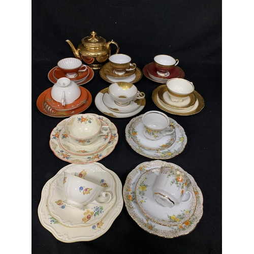 741 - 8 German Porcelain Trios and Royal Worcester Gold Lustre Teapot