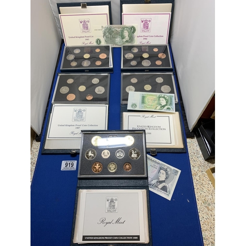 919 - Five Royal Mint Annual Proof Coin Collections 1983, 84, 87,88,89. 2 £1 Notes and 1 £5 note