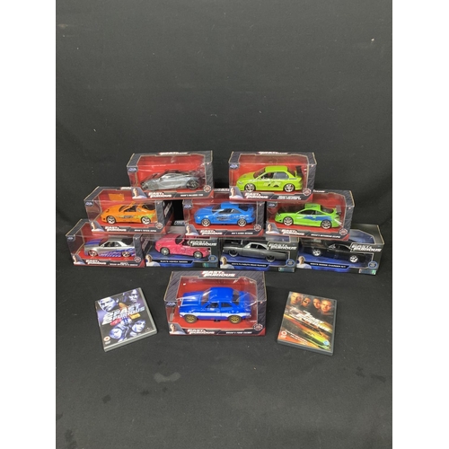 950 - 10 Jada Boxed Fast & Furious Model Cars and 2 DVD's