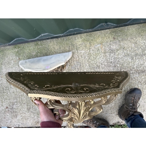 273 - A gold gilt wall mounted console table with marble top together with another gold gilt wall mounted ... 