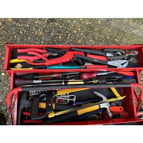 333 - A red task master tool box loaded with assorted tools, saw, wrenches etc