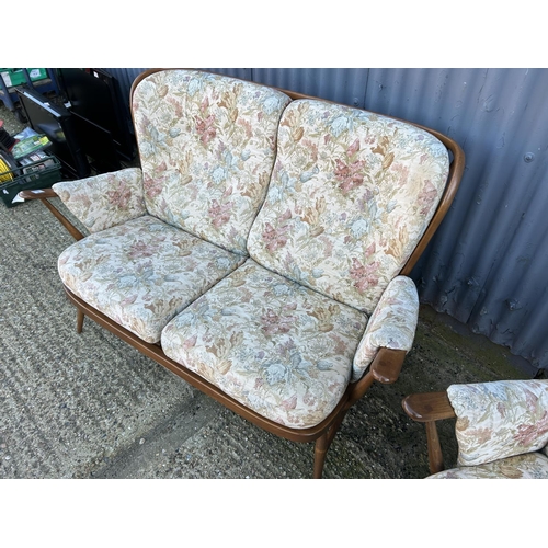 1 - An Ercol golden dawn two piece cottage suite consisting of two seater settee and an armchair