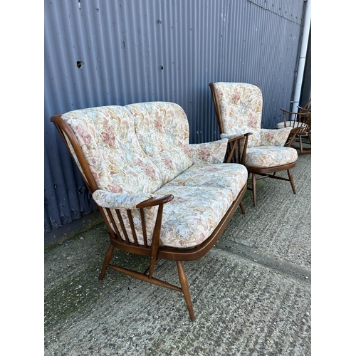 1 - An Ercol golden dawn two piece cottage suite consisting of two seater settee and an armchair