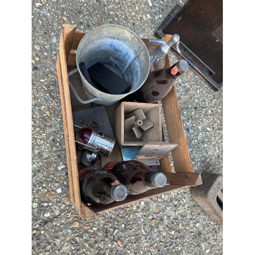 110 - A vintage heater scales, weight and crate of vintage bottles etc