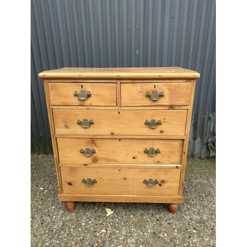 129 - A pine chest of five drawers 90x45x105