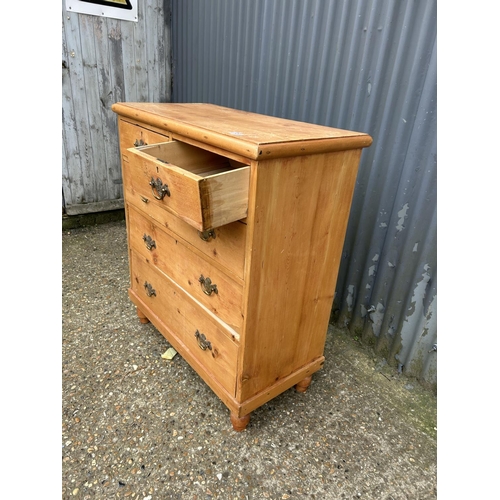 129 - A pine chest of five drawers 90x45x105
