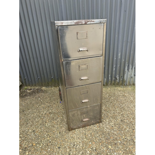 135 - A polished steel four drawer filing cabinet 48x63x132
