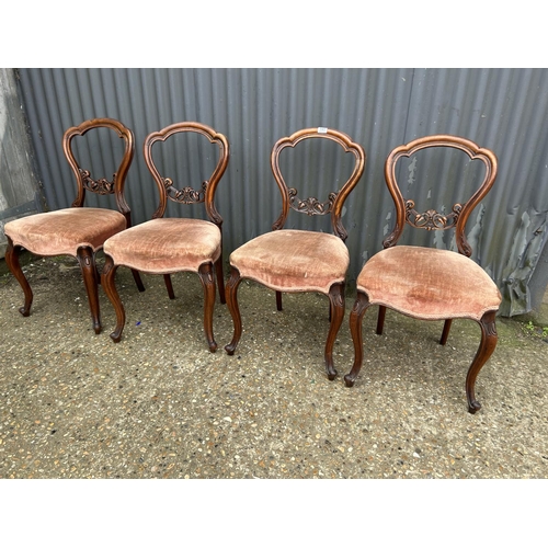 141 - A set of four Victorian mahogany balloon back dining chairs