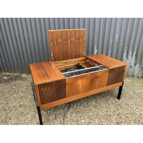 151 - A teak cased HMV radiogram