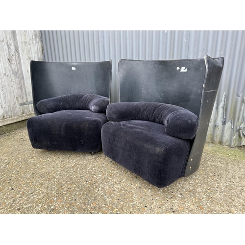 176 - A pair of modern leather and velvet tub shaped chairs