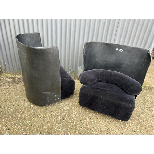 176 - A pair of modern leather and velvet tub shaped chairs