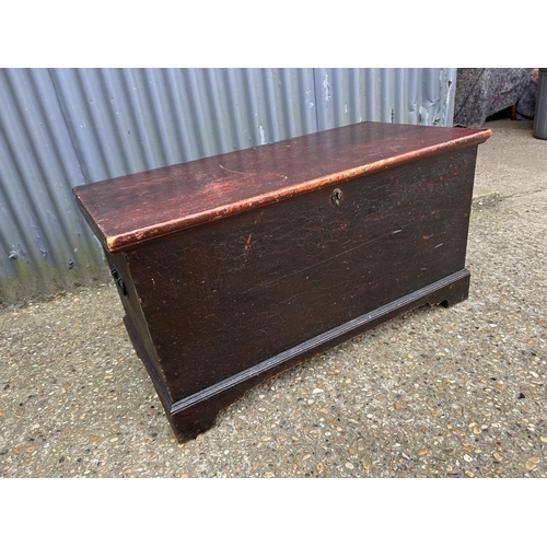 178 - A painted pine blanket box chest fitted with candle box and two drawers to the interior 108x55x58