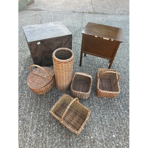 18 - Five pieces basket ware, sewing box and a wooden case