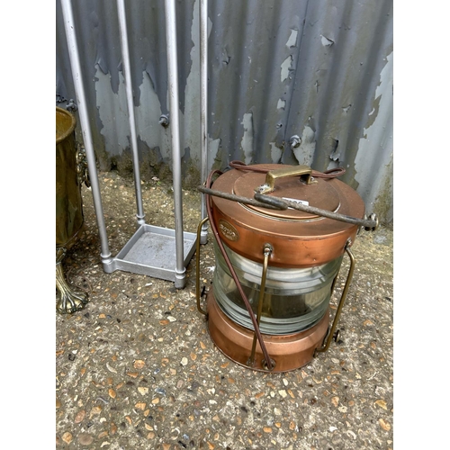 186 - A brass log bin, a Copper Ship Lamp by Griffiths & Sons Birmingham with modern three pin plug and an... 