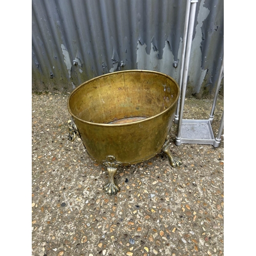 186 - A brass log bin, a Copper Ship Lamp by Griffiths & Sons Birmingham with modern three pin plug and an... 