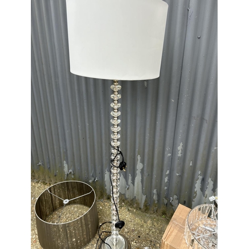 188 - A modern floor lamp with 2 shades together with two modern ceiling light fittings