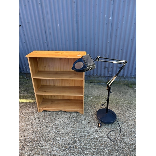 19 - Pine bookcase and a reading lamp