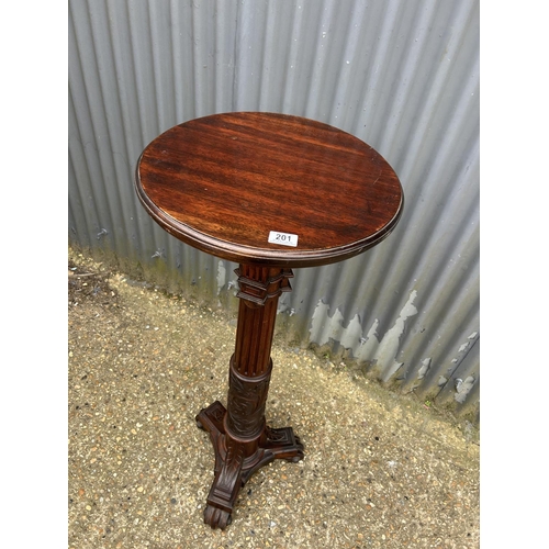 201 - A carved mahogany plant stand 120cm tall