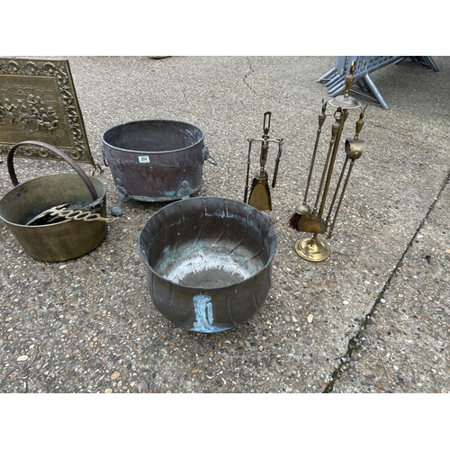 205 - Two copper log bins, brass pan, coal scuttle, screen and two companion sets