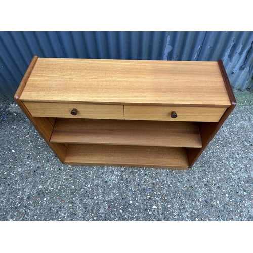 216 - A Nathan teak bookcase with drawers 88x28x70