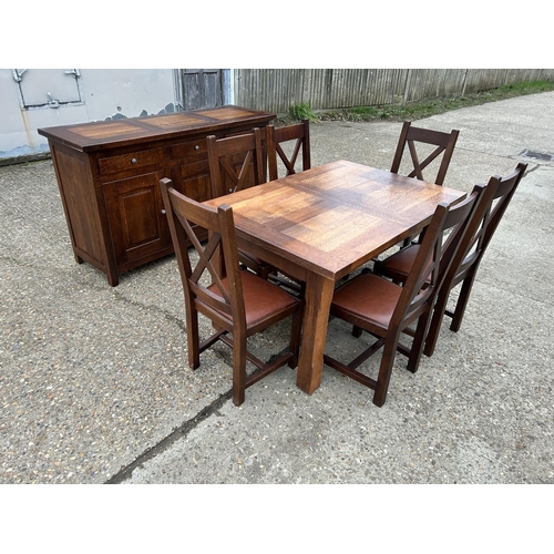 226 - A  complete modern oak dining suite consisting of  and extending table with 6 chairs together with m... 