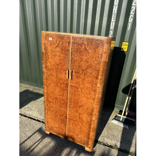 246 - An Art deco style two door gents wardrobe, part fitted to the interior 84x46x160