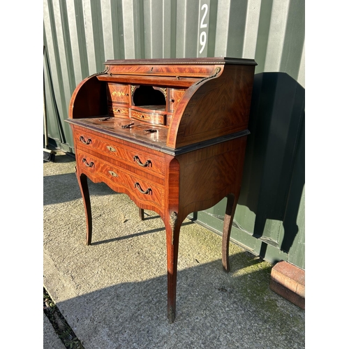 251 - A continental inlaid cylinder top ladies writing table with gilt mounts 76x50x104