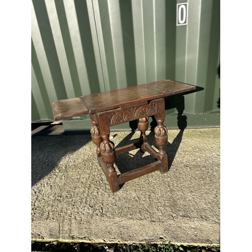 252 - An unusual oak drawer leaf joint stool / table 43x27x50