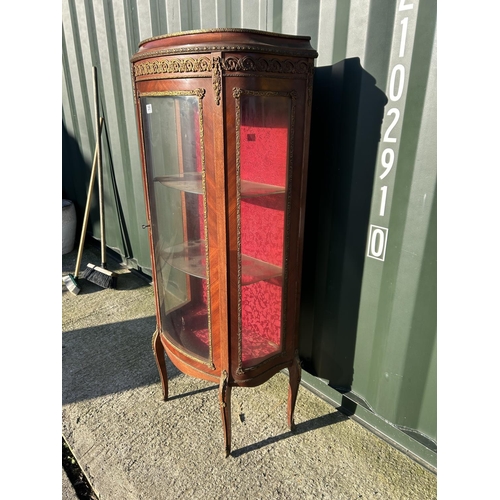 255 - A continental glazed single door cabinet with inlay and gold gilt mounts  70x37x150