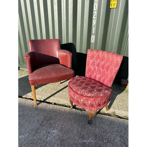 256 - A red leather office desk chair together with a red pattern bedroom chair