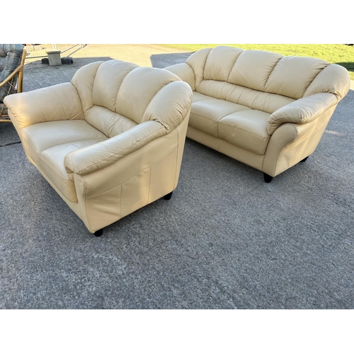 262 - A pair of cream leather sofas labelled LINEA (3 seater & 2 Seater )