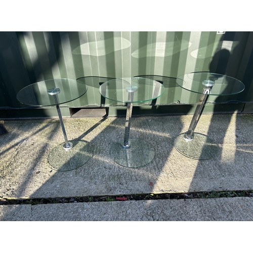 268 - Three modern circular glass occasional tables