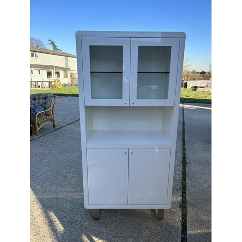 271 - A modern white glass bookcase / cabinet 88x45x180