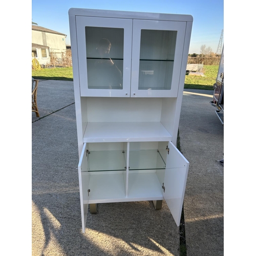 271 - A modern white glass bookcase / cabinet 88x45x180