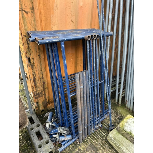 366 - A blue scaffold tower with wheels