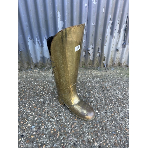 39 - A brass boot umbrella stand