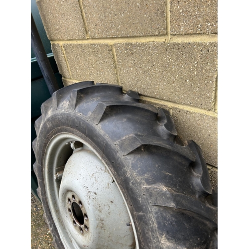 396 - A pair of rear wheels and VICTORIA rubber tyres to fit Ferguson tractor