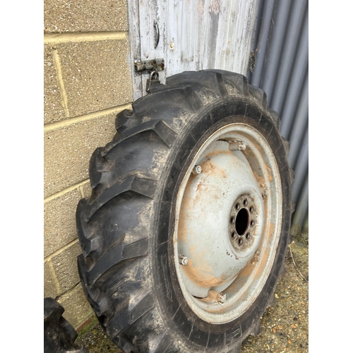 396 - A pair of rear wheels and VICTORIA rubber tyres to fit Ferguson tractor