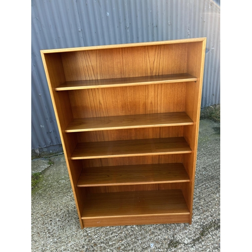 4 - An open fronted teak bookcase by TURNRIDGE 90x28x140