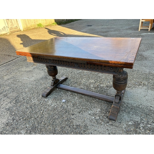 46 - An oak drawer leaf dining table 137x80