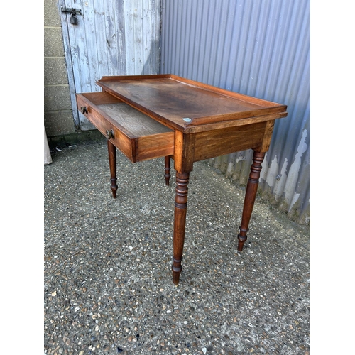 58 - A Victorian mahogany single drawer writing table