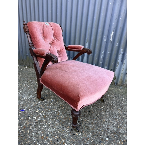 63 - An Edwardian pink upholstered nursing chair