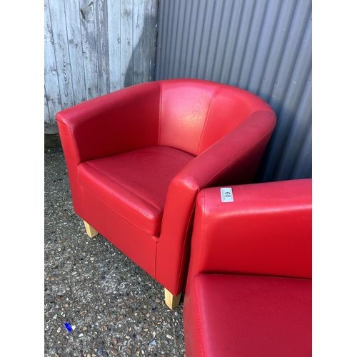 68 - A pair of modern red leather effect tub chairs