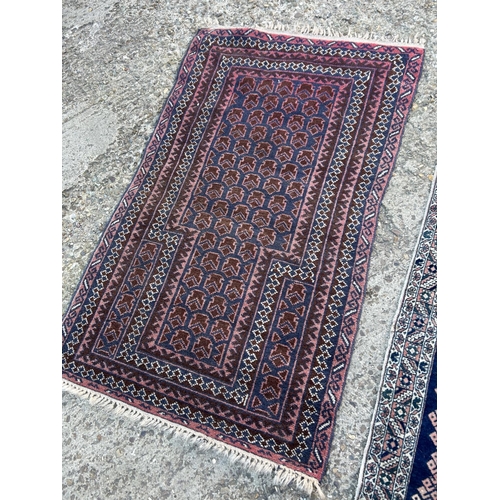 72 - 2 Oriental pattern rugs 128x165