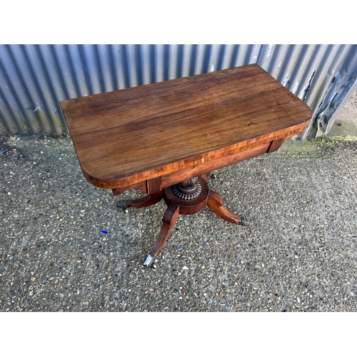 79 - A Victorian rosewood fold over card table