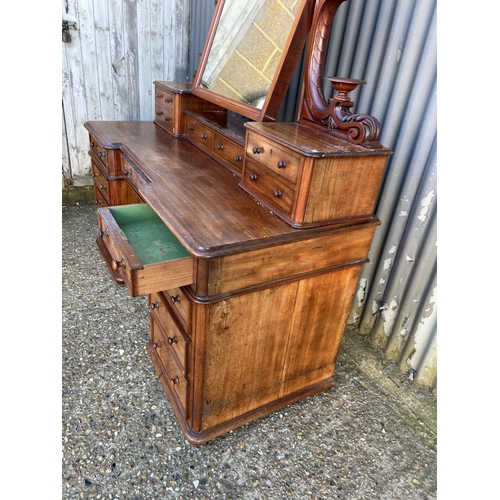 82 - A Victorian mahogany twin pedestal dressing table with swing mirror top over a 9 drawer pedestal bas... 
