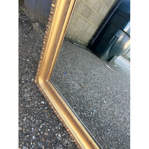 85 - A very large gold gilt framed mirror 110x146