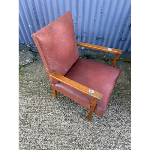 88 - A 20th Century Military armchair stamped A.M
